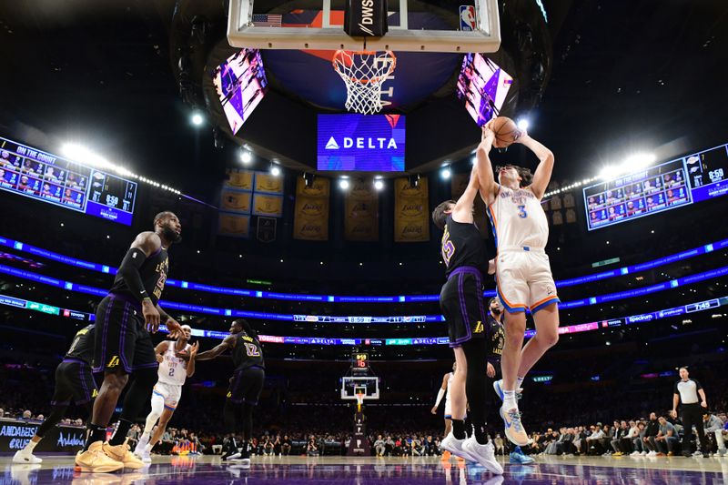 LOS ANGELES, CA - JANUARY 15: Josh Giddey #3 of the Oklahoma City Thunder drives to the basket during the game against the Los Angeles Lakers on January 15, 2024 at Crypto.Com Arena in Los Angeles, California. NOTE TO USER: User expressly acknowledges and agrees that, by downloading and/or using this Photograph, user is consenting to the terms and conditions of the Getty Images License Agreement. Mandatory Copyright Notice: Copyright 2024 NBAE (Photo by Adam Pantozzi/NBAE via Getty Images)