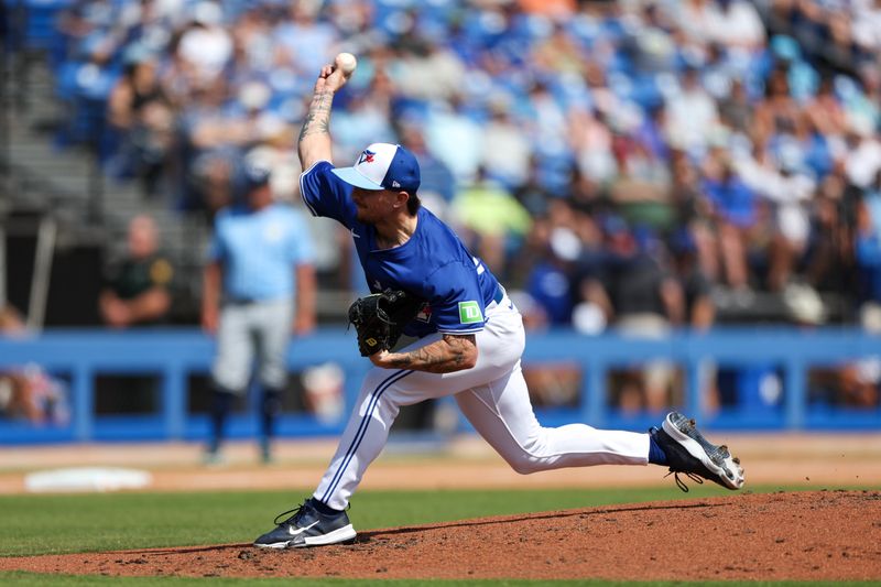 Feb 28, 2024; Dunedin, Florida, USA;  Toronto Blue Jays pitcher Devereaux Henderson (67) throws a pitch against the Tampa Bay Rays in the third inning at TD Ballpark. Mandatory Credit: Nathan Ray Seebeck-USA TODAY Sports