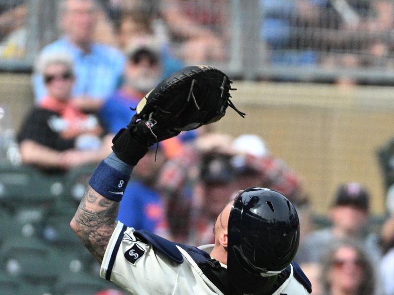 Sep 10, 2023; Minneapolis, Minnesota, USA; Minnesota Twins catcher Christian Vazquez (8) catches a pop fly in the infield against the New York Mets in the seventh inning at Target Field. Mandatory Credit: Michael McLoone-USA TODAY Sports