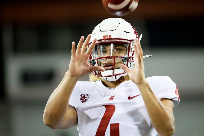 Nov 7, 2020; Corvallis, Oregon, USA; Washington State Cougars quarterback Jayden de Laura (4) warms up prior to the game against the Oregon State Beavers at Reser Stadium. Mandatory Credit: Soobum Im-USA TODAY Sports