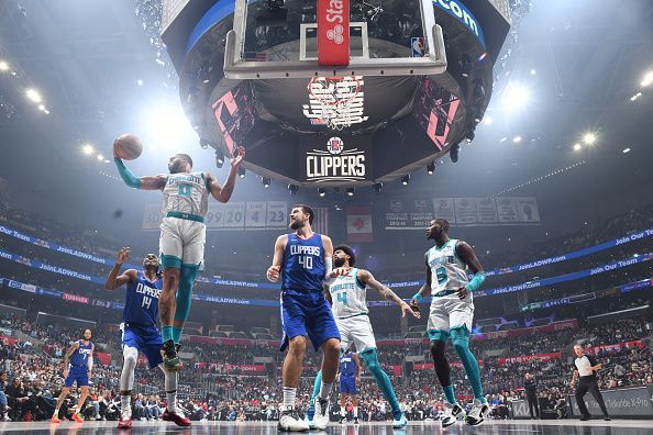 LOS ANGELES, CA - DECEMBER 26:  Miles Bridges #0 of the Charlotte Hornets grabs the rebound during the game  on December 26, 2023 at Crypto.Com Arena in Los Angeles, California. NOTE TO USER: User expressly acknowledges and agrees that, by downloading and/or using this Photograph, user is consenting to the terms and conditions of the Getty Images License Agreement. Mandatory Copyright Notice: Copyright 2023 NBAE (Photo by Juan Ocampo/NBAE via Getty Images)