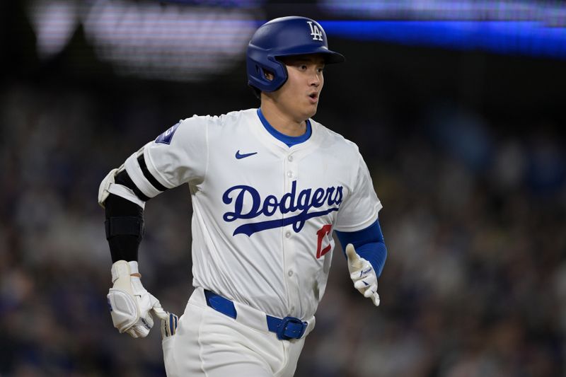 Apr 2, 2024; Los Angeles, California, USA;  Los Angeles Dodgers designated hitter Shohei Ohtani (17) runs to first on a ground out in the sixth against the San Francisco Giants at Dodger Stadium. Mandatory Credit: Jayne Kamin-Oncea-USA TODAY Sports