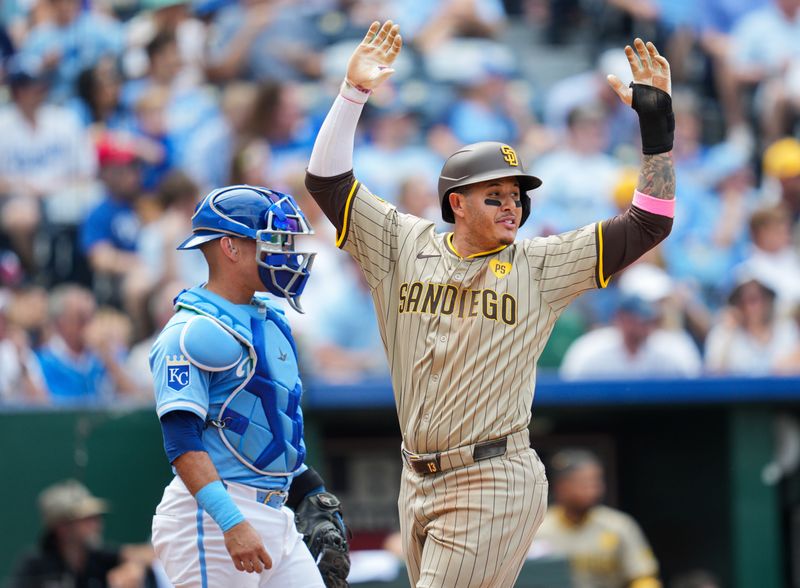 Jun 1, 2024; Kansas City, Missouri, USA; San Diego Padres third baseman Manny Machado (13) scores a run against Kansas City Royals catcher Freddy Fermin (34) during the fourth inning at Kauffman Stadium. Mandatory Credit: Jay Biggerstaff-USA TODAY Sports