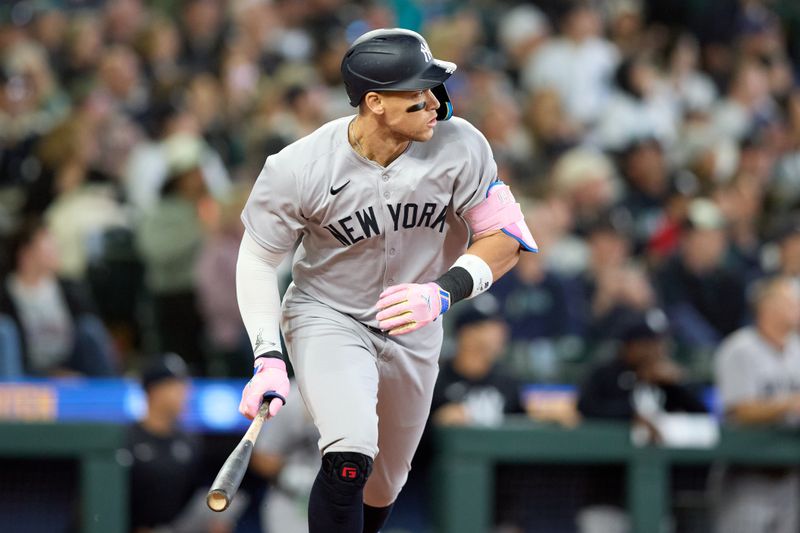 May 14, 2025; Seattle, Washington, USA; New York Yankees designated hitter Aaron Judge (99) hits a solo home run off Seattle Mariners pitcher Carlos Vargas (not pictured) during the eighth inning at T-Mobile Park. Mandatory Credit: John Froschauer-Imagn Images