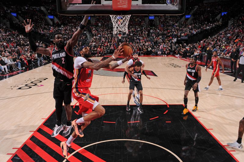 PORTLAND, OR - FEBRUARY 10: Brandon Ingram #14 of the New Orleans Pelicans drives to the basket during the game against the Portland Trail Blazers on February 10, 2024 at the Moda Center Arena in Portland, Oregon. NOTE TO USER: User expressly acknowledges and agrees that, by downloading and or using this photograph, user is consenting to the terms and conditions of the Getty Images License Agreement. Mandatory Copyright Notice: Copyright 2024 NBAE (Photo by Cameron Browne/NBAE via Getty Images)