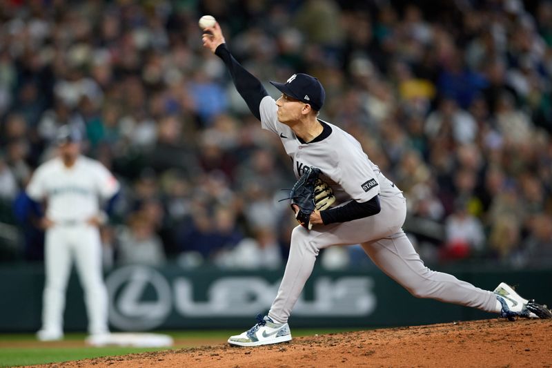 May 14, 2025; Seattle, Washington, USA; New York Yankees pitcher Luke Weaver (30) throws against the Seattle Mariners during the ninth inning at T-Mobile Park. Mandatory Credit: John Froschauer-Imagn Images