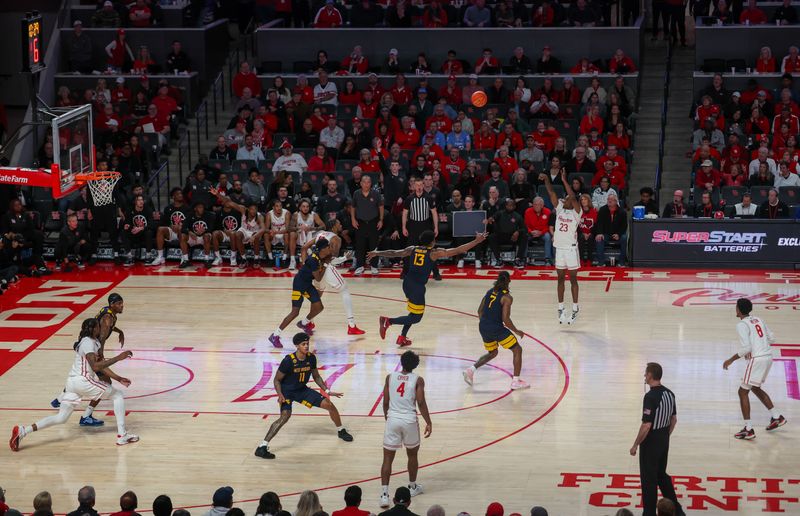 Jan 15, 2025; Houston, Texas, USA;  Houston Cougars guard Terrance Arceneaux (23) makes a three point basket against the West Virginia Mountaineers in the second half at Fertitta Center. Mandatory Credit: Thomas Shea-Imagn Images