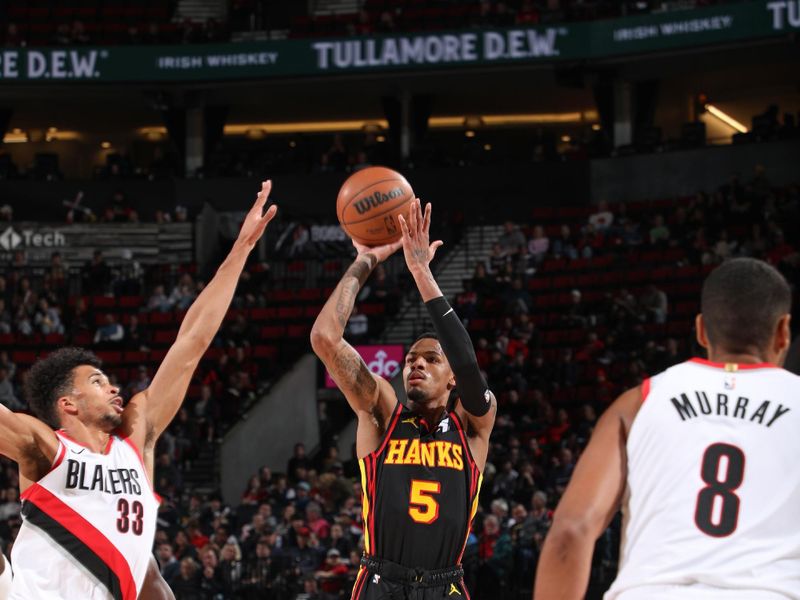 PORTLAND, OR - MARCH 13:  Dejounte Murray #5 of the Atlanta Hawks shoots the ball during the game  on March 13, 2024 at the Moda Center Arena in Portland, Oregon. NOTE TO USER: User expressly acknowledges and agrees that, by downloading and or using this photograph, user is consenting to the terms and conditions of the Getty Images License Agreement. Mandatory Copyright Notice: Copyright 2024 NBAE (Photo by Cameron Browne/NBAE via Getty Images)