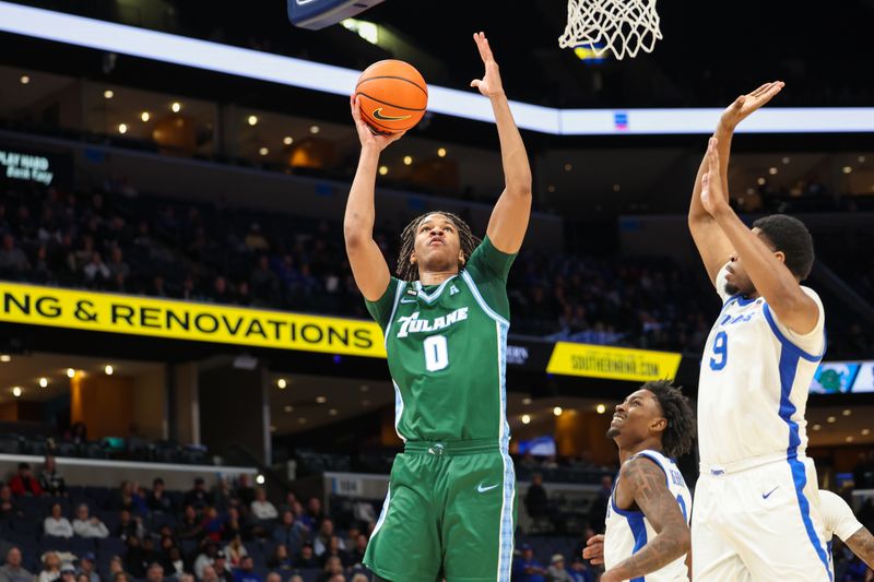 Feb 1, 2026; Memphis, Tennessee, USA; Tulane Green Wave forward Tyler Ringgold (0) shoots the ball against Memphis Tigers forward Tariq Ingraham (19) during the second half at FedExForum. Mandatory Credit: Wesley Hale-Imagn Images