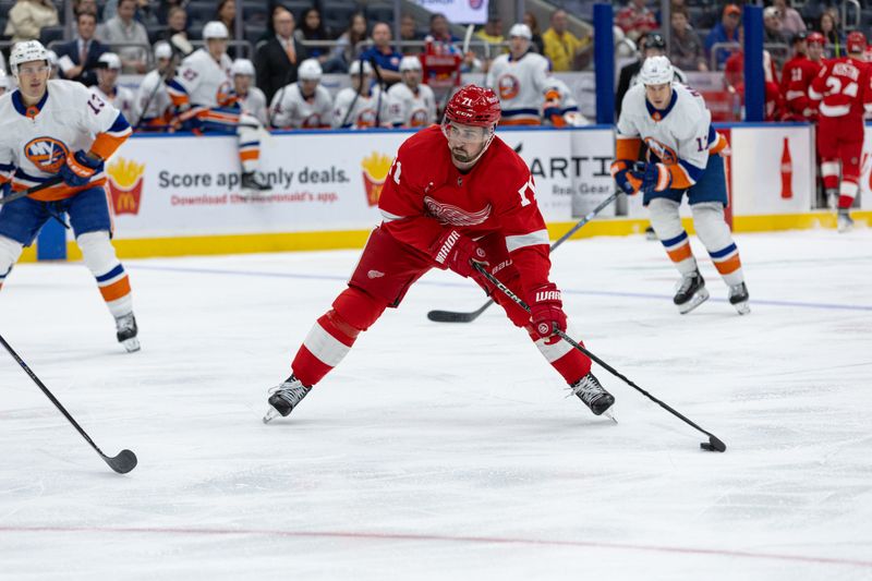 Oct 30, 2023; Elmont, New York, USA; Detroit Red Wings center Dylan Larkin (71) looks to take a shot against the New York Islanders during the first period at UBS Arena. Mandatory Credit: Thomas Salus-USA TODAY Sports