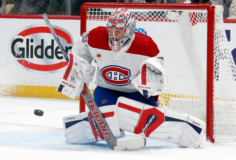 Feb 22, 2024; Pittsburgh, Pennsylvania, USA; Montreal Canadiens goaltender Cayden Primeau (30) makes a save against the Pittsburgh Penguins during the first period at PPG Paints Arena. Mandatory Credit: Charles LeClaire-USA TODAY Sports