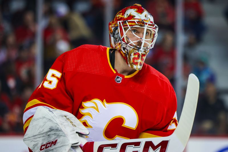 Mar 4, 2024; Calgary, Alberta, CAN; Calgary Flames goaltender Jacob Markstrom (25) during the first period against the Seattle Kraken at Scotiabank Saddledome. Mandatory Credit: Sergei Belski-USA TODAY Sports