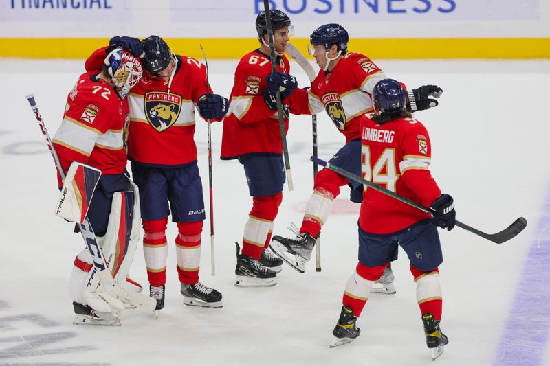 Nov 6, 2023; Sunrise, Florida, USA; Florida Panthers goaltender Sergei Bobrovsky (72) celebrates with teammates after winning the game against the Columbus Blue Jackets at Amerant Bank Arena. Mandatory Credit: Sam Navarro-USA TODAY Sports