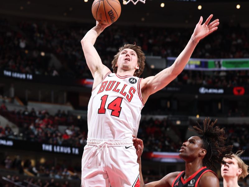 CHICAGO, IL - FEBRUARY 28:  Matas Buzelis #14 of Chicago Bulls drives to the basket during the game against the Toronto Raptors on February 28, 2025 at United Center in Chicago, Illinois. NOTE TO USER: User expressly acknowledges and agrees that, by downloading and or using this photograph, User is consenting to the terms and conditions of the Getty Images License Agreement. Mandatory Copyright Notice: Copyright 2025 NBAE (Photo by Jeff Haynes/NBAE via Getty Images)