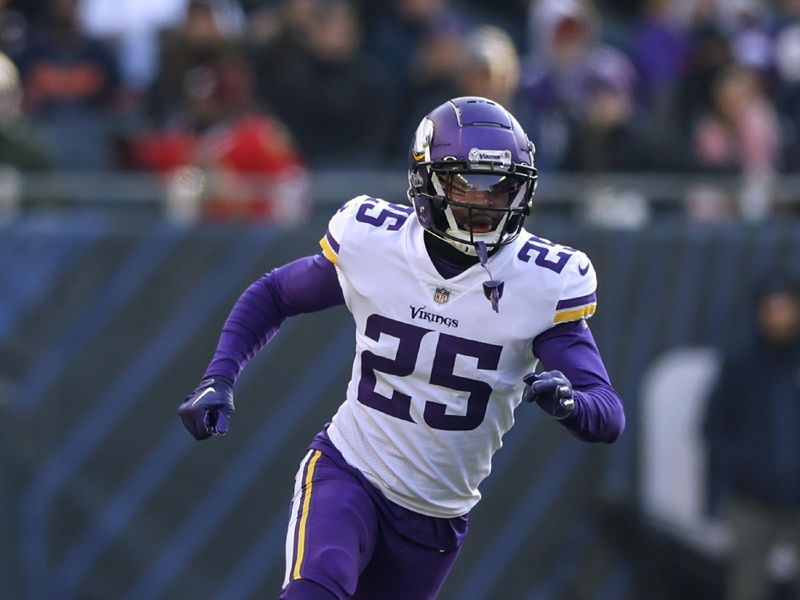 Minnesota Vikings safety Theo Jackson (25) runs on the field during the second half of an NFL football game against the Chicago Bears, Sunday, Jan. 8, 2023, in Chicago. (AP Photo/Kamil Krzaczynski)