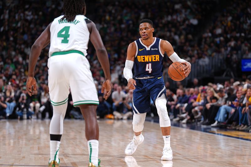 DENVER, CO - JANUARY 7: Russell Westbrook #4 of the Denver Nuggets dribbles the ball during the game against the Boston Celtics on January 7, 2025 at Ball Arena in Denver, Colorado. NOTE TO USER: User expressly acknowledges and agrees that, by downloading and/or using this Photograph, user is consenting to the terms and conditions of the Getty Images License Agreement. Mandatory Copyright Notice: Copyright 2025 NBAE (Photo by Garrett Ellwood/NBAE via Getty Images)