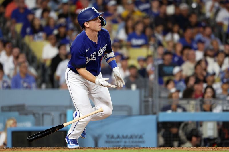 Aug 3, 2023; Los Angeles, California, USA;  Los Angeles Dodgers designated hitter Will Smith (16) hits an RBI single during the sixth inning against the Oakland Athletics at Dodger Stadium. Mandatory Credit: Kiyoshi Mio-USA TODAY Sports