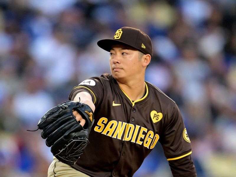 Apr 14, 2024; Los Angeles, California, USA; San Diego Padres pitcher Yuki Matsui (1) throws to the plate in the seventh inning against the Los Angeles Dodgers at Dodger Stadium. Mandatory Credit: Jayne Kamin-Oncea-USA TODAY Sports