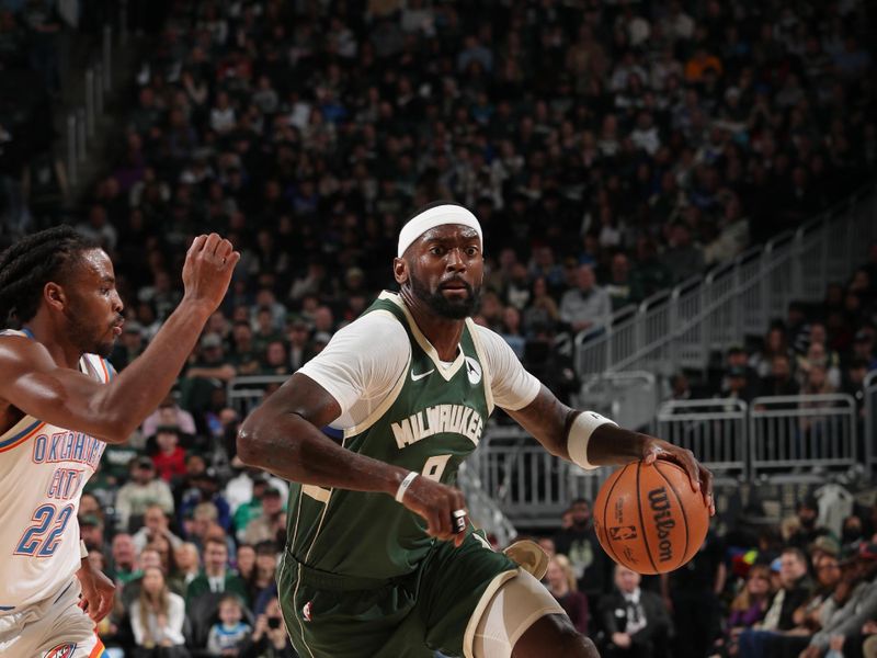 MILWAUKEE, WI - MARCH 24: Bobby Portis #9 of the Milwaukee Bucks handles the ball during the game against the Oklahoma City Thunder on March 24, 2024 at the Fiserv Forum Center in Milwaukee, Wisconsin. NOTE TO USER: User expressly acknowledges and agrees that, by downloading and or using this Photograph, user is consenting to the terms and conditions of the Getty Images License Agreement. Mandatory Copyright Notice: Copyright 2024 NBAE (Photo by Gary Dineen/NBAE via Getty Images).