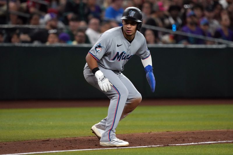 Jun 27, 2025; Phoenix, Arizona, USA; Miami Marlins second base Javier Sanoja (46) leads off third base against the Arizona Diamondbacks in the sixth inning at Chase Field. Mandatory Credit: Rick Scuteri-Imagn Images