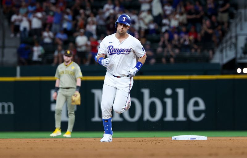 Jul 2, 2024; Arlington, Texas, USA;  Texas Rangers first baseman Nathaniel Lowe (30) runs the bases after hitting a two-run home run during the first inning against the San Diego Padres at Globe Life Field. Mandatory Credit: Kevin Jairaj-USA TODAY Sports