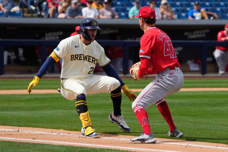 Mar 18, 2024; Phoenix, Arizona, USA; Los Angeles Angels starting pitcher Griffin Canning (47) tags out Milwaukee Brewers second baseman Brice Turang (2) in the second inning at American Family Fields of Phoenix. Mandatory Credit: Rick Scuteri-USA TODAY Sports