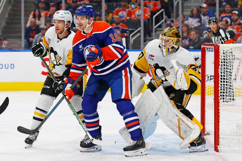 Oct 25, 2024; Edmonton, Alberta, CAN; Edmonton Oilers forward Zach Hyman (18) tries to screen Pittsburgh Penguins goaltender Joel Blomqvist (30) during the first period at Rogers Place. Mandatory Credit: Perry Nelson-Imagn Images