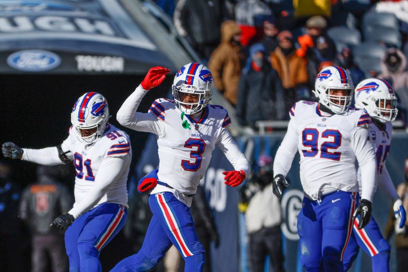 Buffalo Bills safety Damar Hamlin (3) reacts during the first half of an NFL football game against the Chicago Bears, Saturday, Dec. 24, 2022, in Chicago. (AP Photo/Kamil Krzaczynski)