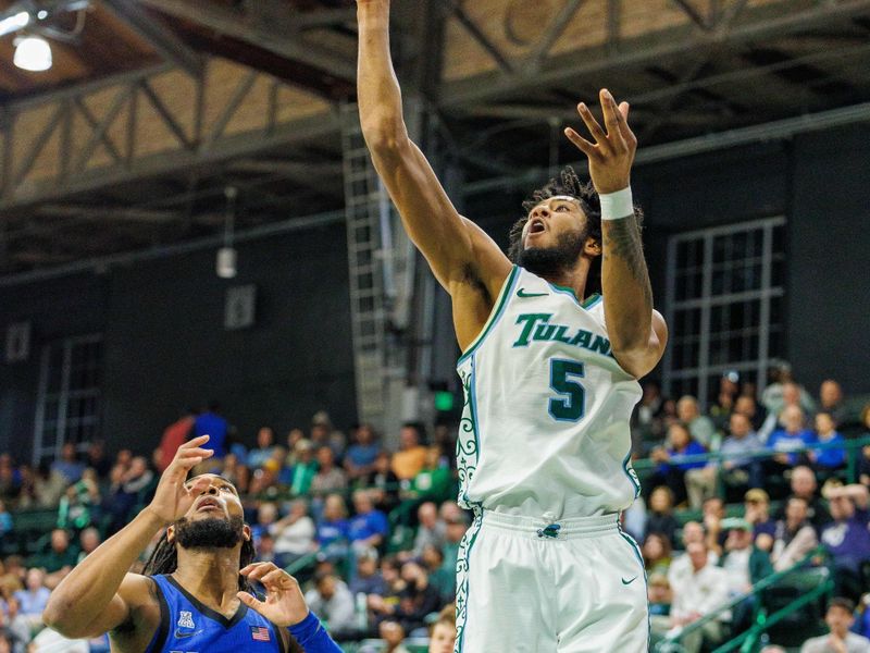 Jan 30, 2025; New Orleans, Louisiana, USA; Tulane Green Wave guard Mari Jordan (5) shoots a jump shot against Memphis Tigers guard Tyrese Hunter (11) during the second half at Avron B. Fogelman Arena in Devlin Fieldhouse. Mandatory Credit: Stephen Lew-Imagn Images