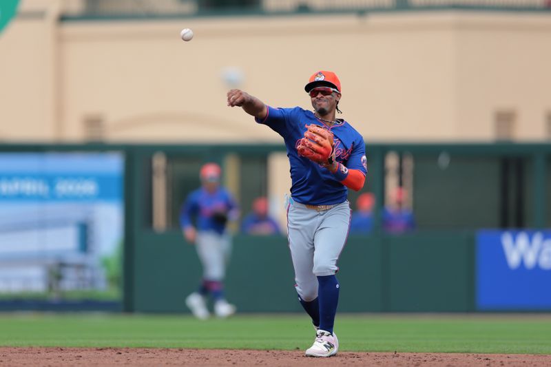 Feb 24, 2025; Jupiter, Florida, USA; New York Mets shortstop Francisco Lindor (12) throws to first base and retires St. Louis Cardinals second baseman Brendan Donovan (not pictured) during the third inning at Roger Dean Chevrolet Stadium. Mandatory Credit: Sam Navarro-Imagn Images