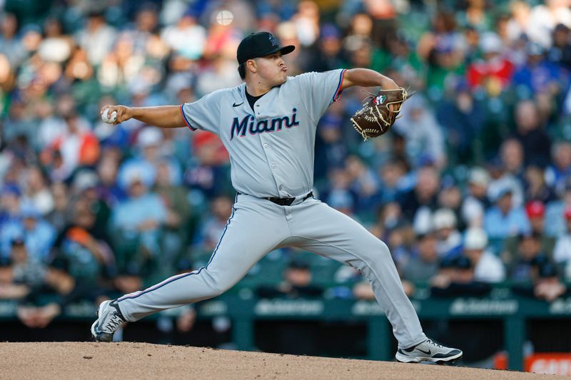 May 13, 2025; Chicago, Illinois, USA; Miami Marlins starting pitcher Valente Bellozo (83) delivers a pitch against the Chicago Cubs during the first inning at Wrigley Field. Mandatory Credit: Kamil Krzaczynski-Imagn Images