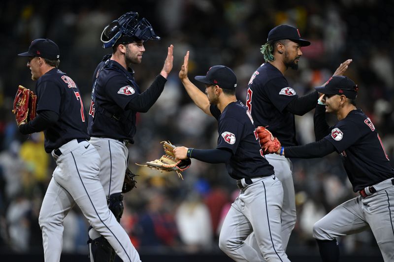 Jun 15, 2023; San Diego, California, USA; Cleveland Guardians catcher David Fry (12) celebrates with left fielder Steven Kwan (38) after defeating the San Diego Padres at Petco Park. Mandatory Credit: Orlando Ramirez-USA TODAY Sports