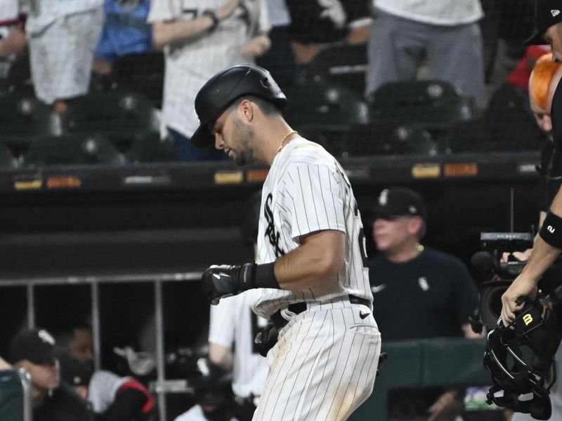 Aug 22, 2023; Chicago, Illinois, USA; Chicago White Sox left fielder Andrew Benintendi (23) crosses home plate after hitting a home run against the Seattle Mariners during the ninth inning at Guaranteed Rate Field. Mandatory Credit: Matt Marton-USA TODAY Sports