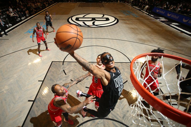 BROOKLYN, NY - MARCH 29: Nicolas Claxton #33 of the Brooklyn Nets drives to the basket during the game against the Chicago Bulls on March 29, 2024 at Barclays Center in Brooklyn, New York. NOTE TO USER: User expressly acknowledges and agrees that, by downloading and or using this Photograph, user is consenting to the terms and conditions of the Getty Images License Agreement. Mandatory Copyright Notice: Copyright 2024 NBAE (Photo by Nathaniel S. Butler/NBAE via Getty Images)