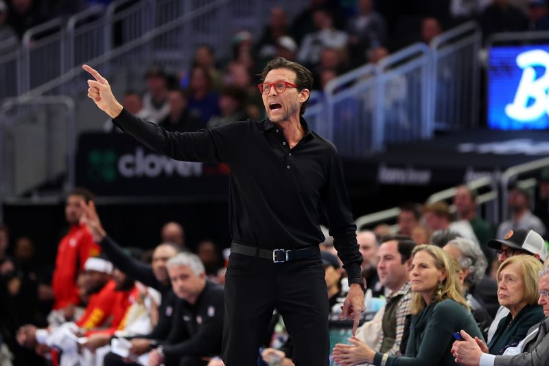 MILWAUKEE, WISCONSIN - DECEMBER 02: Head coach Quin Snyder of the Atlanta Hawks reacts to an officials call during the first half of a game against the Milwaukee Bucks at Fiserv Forum on December 02, 2023 in Milwaukee, Wisconsin. NOTE TO USER: User expressly acknowledges and agrees that, by downloading and or using this photograph, User is consenting to the terms and conditions of the Getty Images License Agreement. (Photo by Stacy Revere/Getty Images)