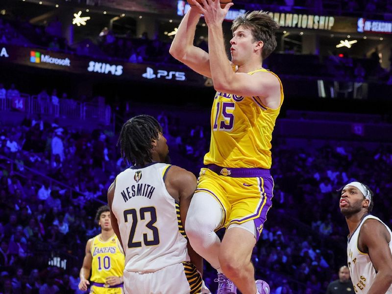 LAS VEGAS, NEVADA - DECEMBER 09: Austin Reaves #15 of the Los Angeles Lakers shoots against Aaron Nesmith #23 of the Indiana Pacers in the second quarter of the championship game of the inaugural NBA In-Season Tournament at T-Mobile Arena on December 09, 2023 in Las Vegas, Nevada. The Lakers defeated the Pacers 123-109. NOTE TO USER: User expressly acknowledges and agrees that, by downloading and or using this photograph, User is consenting to the terms and conditions of the Getty Images License Agreement. (Photo by Ethan Miller/Getty Images)