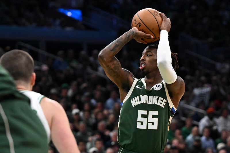 BOSTON, MASSACHUSETTS - OCTOBER 28: Delon Wright #55 of the Milwaukee Bucks attempts a basket against the Boston Celtics during the first half at the TD Garden on October 28, 2024 in Boston, Massachusetts. NOTE TO USER: User expressly acknowledges and agrees that, by downloading and or using this photograph, User is consenting to the terms and conditions of the Getty Images License Agreement. (Photo by Brian Fluharty/Getty Images)