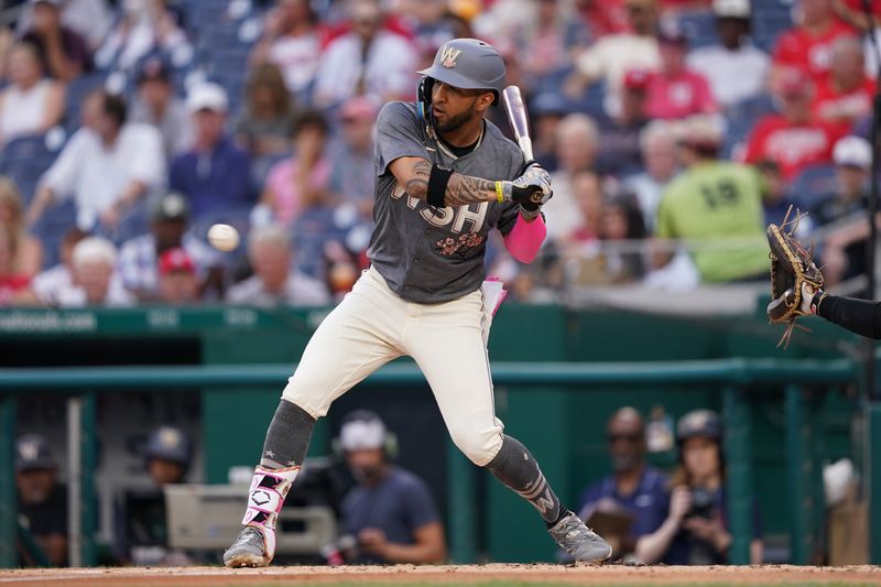 Jun 14, 2024; Washington, District of Columbia, USA; Washington Nationals designated hitter Eddie Rosario (8) watches the ball during the first inning against the Miami Marlins at Nationals Park. Mandatory Credit: Amber Searls-USA TODAY Sports