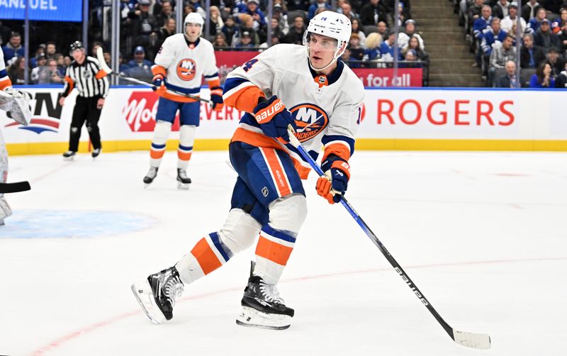 Feb 5, 2024; Toronto, Ontario, CAN;  New York Islanders forward Bo Horvat (14) looks to receive a pass against the Toronto Maple Leafs in the third period at Scotiabank Arena. Mandatory Credit: Dan Hamilton-USA TODAY Sports