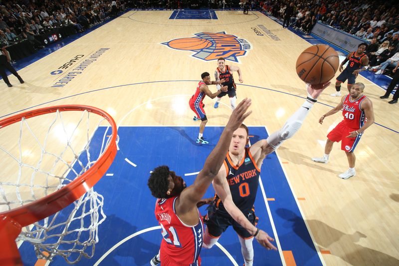 NEW YORK, NY - APRIL 22:  Donte Divincenzo #0 of the New York Knicks goes to the basket during the game against the Philadelphia 76ers during Round 1 Game 2 of the 2024 NBA Playoffs on April 22, 2024 at Madison Square Garden in New York City, New York.  NOTE TO USER: User expressly acknowledges and agrees that, by downloading and or using this photograph, User is consenting to the terms and conditions of the Getty Images License Agreement. Mandatory Copyright Notice: Copyright 2024 NBAE  (Photo by Nathaniel S. Butler/NBAE via Getty Images)