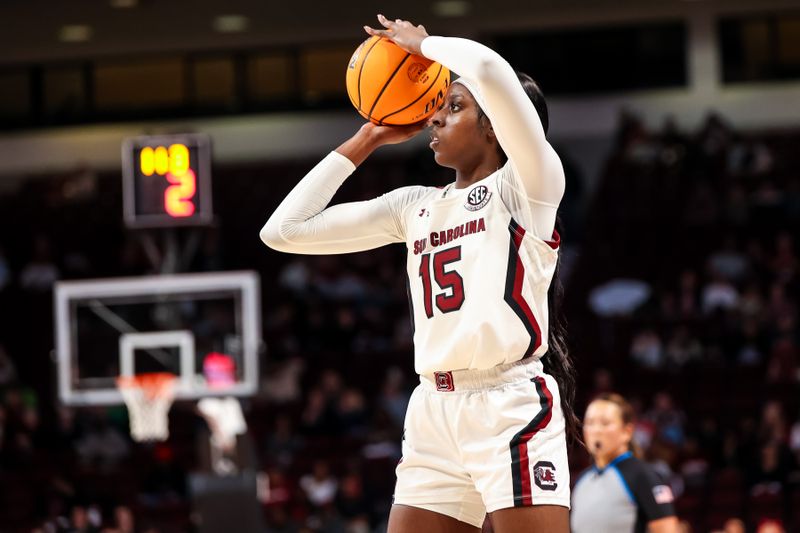 Jan 5, 2023; Columbia, South Carolina, USA; South Carolina Gamecocks forward Laeticia Amihere (15) makes a three point basket against the Auburn Tigers in the second half at Colonial Life Arena. Mandatory Credit: Jeff Blake-USA TODAY Sports