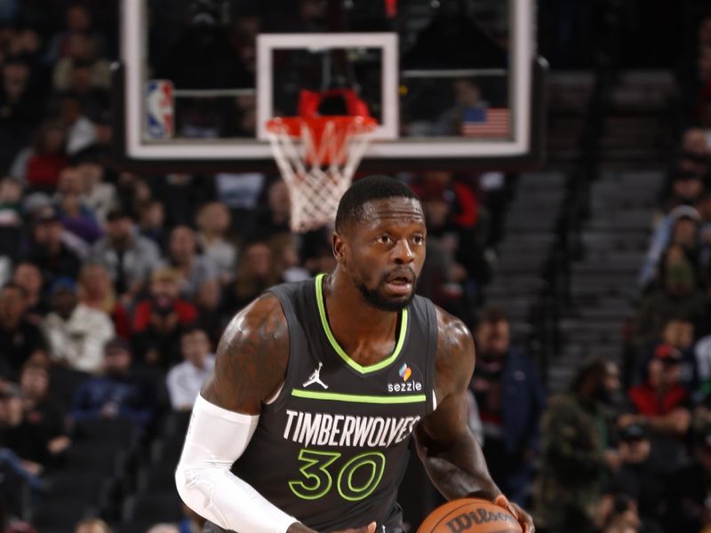 PORTLAND, OR - NOVEMBER 13: Julius Randle #30 of the Minnesota Timberwolves looks to pass the ball during the game against the Portland Trail Blazers on November 13, 2024 at the Moda Center Arena in Portland, Oregon. NOTE TO USER: User expressly acknowledges and agrees that, by downloading and or using this photograph, user is consenting to the terms and conditions of the Getty Images License Agreement. Mandatory Copyright Notice: Copyright 2024 NBAE (Photo by Cameron Browne/NBAE via Getty Images)