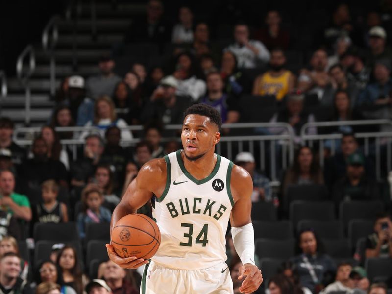 MILWAUKEE, WI - OCTOBER 10: Giannis Antetokounmpo #34 of the Milwaukee Bucks dribbles the ball during the game against the Los Angeles Lakers during a preseason game on October 10, 2024 at Fiserv Forum Center in Milwaukee, Wisconsin. NOTE TO USER: User expressly acknowledges and agrees that, by downloading and or using this Photograph, user is consenting to the terms and conditions of the Getty Images License Agreement. Mandatory Copyright Notice: Copyright 2024 NBAE (Photo by Gary Dineen/NBAE via Getty Images).