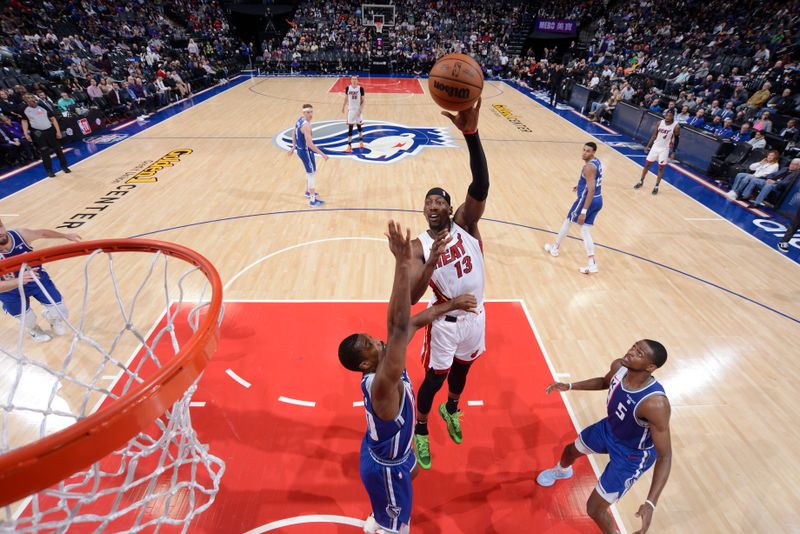 SACRAMENTO, CA - FEBRUARY 26: Bam Adebayo #13 of the Miami Heat drives to the basket during the game against the Sacramento Kings on February 26, 2024 at Golden 1 Center in Sacramento, California. NOTE TO USER: User expressly acknowledges and agrees that, by downloading and or using this Photograph, user is consenting to the terms and conditions of the Getty Images License Agreement. Mandatory Copyright Notice: Copyright 2024 NBAE (Photo by Rocky Widner/NBAE via Getty Images)