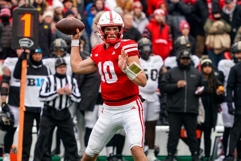 Oct 28, 2023; Lincoln, Nebraska, USA; Nebraska Cornhuskers quarterback Heinrich Haarberg (10) passes against the Purdue Boilermakers during the first quarter at Memorial Stadium. Mandatory Credit: Dylan Widger-USA TODAY Sports