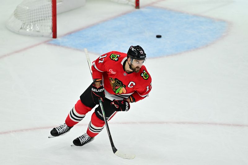 Nov 21, 2024; Chicago, Illinois, USA; Chicago Blackhawks left wing Nick Foligno (17) after scoring an empty net goal against the Florida Panthers during the third period at the United Center. Mandatory Credit: Daniel Bartel-Imagn Images