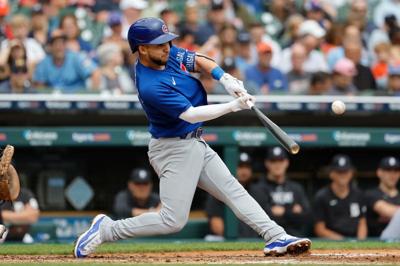 Aug 23, 2023; Detroit, Michigan, USA;  Chicago Cubs third baseman Nick Madrigal (1) hits an RBI single in the fourth inning against the Detroit Tigers at Comerica Park. Mandatory Credit: Rick Osentoski-USA TODAY Sports