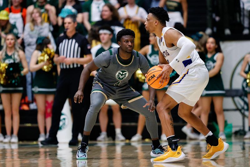 Feb 9, 2024; Fort Collins, Colorado, USA; San Jose State Spartans guard Myron Amey Jr. (0) controls the ball as Colorado State Rams guard Isaiah Stevens (4) guards in the second half at Moby Arena. Mandatory Credit: Isaiah J. Downing-USA TODAY Sports