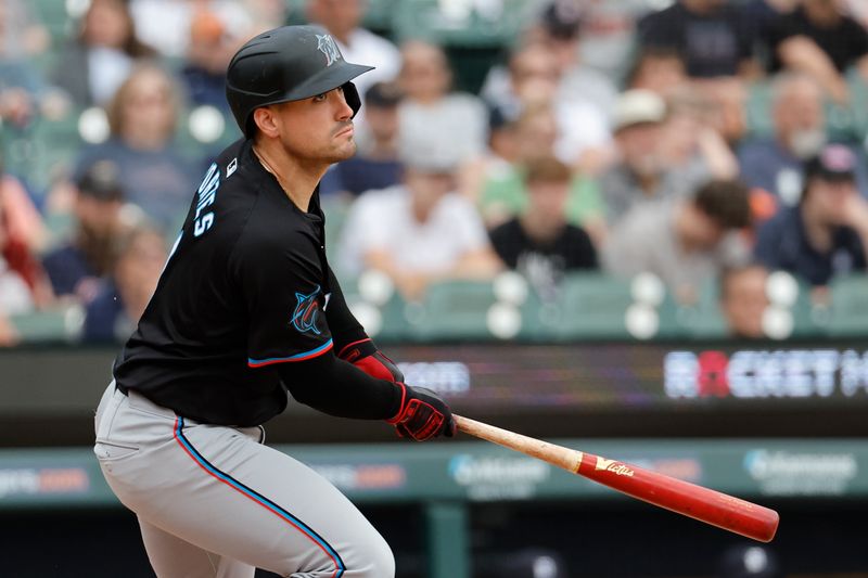 May 15, 2024; Detroit, Michigan, USA;  Miami Marlins catcher Nick Fortes (4) hits a single in the eighth inning against the Detroit Tigers at Comerica Park. Mandatory Credit: Rick Osentoski-USA TODAY Sports