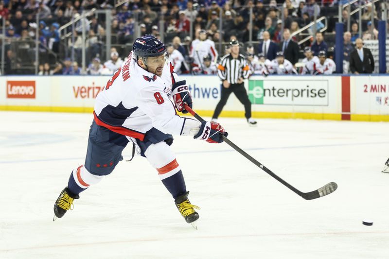 Oct 12, 2025; New York, New York, USA;  Washington Capitals left wing Alex Ovechkin (8) attempts a shot on goal in the first period against the New York Rangers at Madison Square Garden. Mandatory Credit: Wendell Cruz-Imagn Images